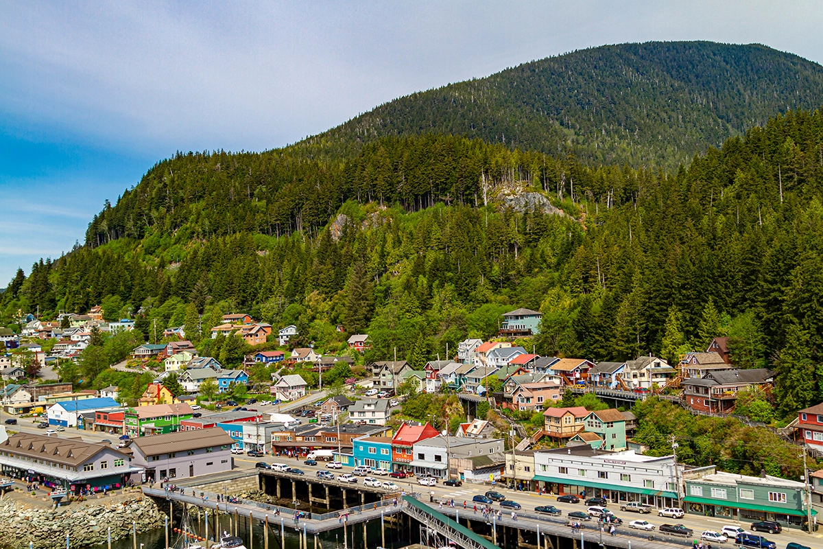 Aerial view of downtown Ketchikan, Alaska with waterfront buildings and surrounding forested hills